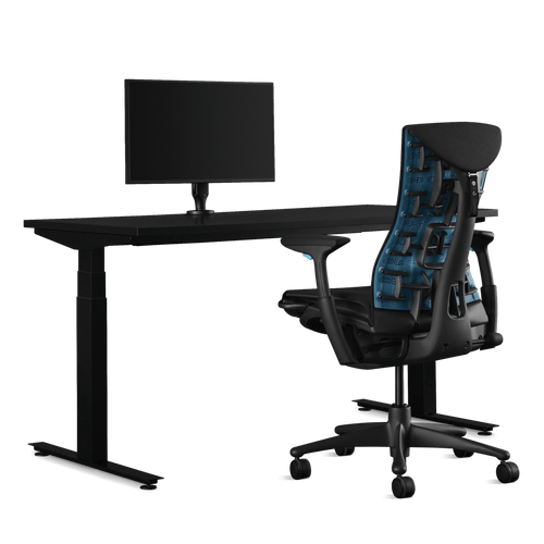Herman Miller gaming bundle, featuring a Nevi sit-stand desk, Ollin monitor arm and a Logitech G Embody chair in cyan.